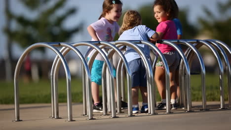 children playing on a bike rack