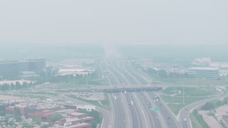 smoke-filled cityscape with hazy visibility from wildfire smoke in mississauga, ontario