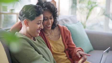 lgbt, laptop and talking lesbian couple