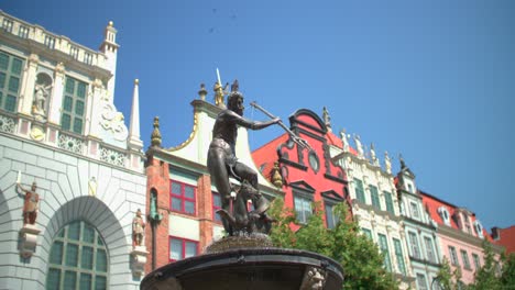 neptune fountain bronze metal, gdansk poland, europe town square architecture