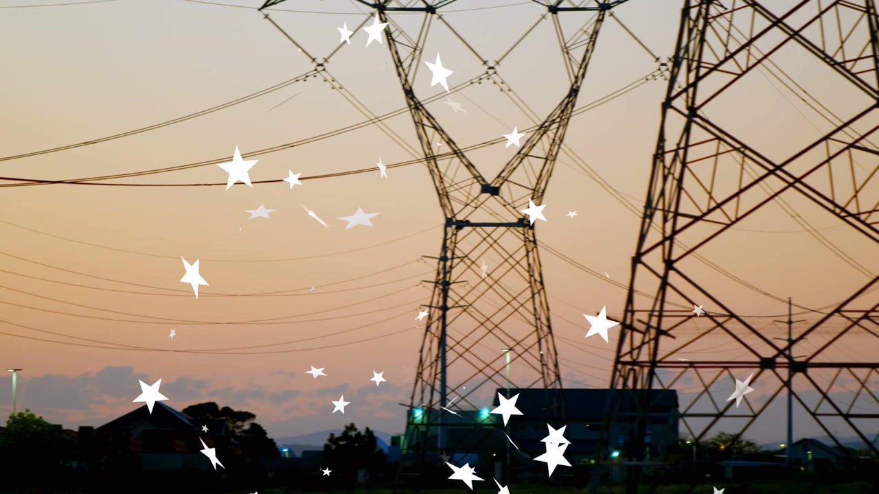Camera panning right, revealing towers rising and white stars floating across dusk, showing grid