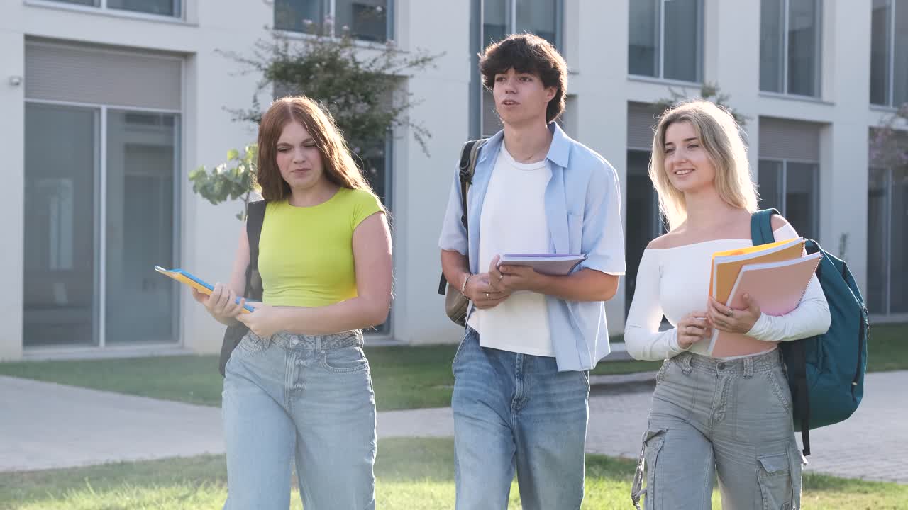 University students chatting and walking on campus