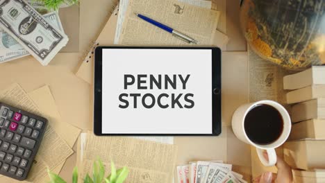 penny stocks displaying on finance tablet screen