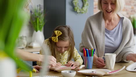 Tracking-video-of-little-girl-drawing-Easter-bunny