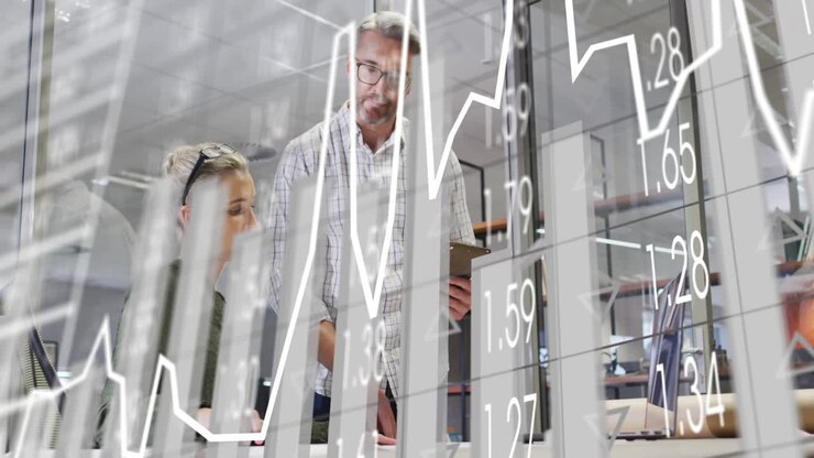 Animation of financial data processing over diverse business people in office