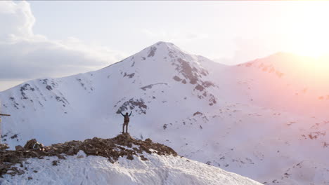 hiker on a mountain summit