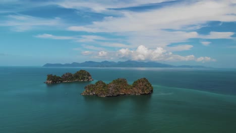 cinematic slow motion aerial of rocky islands