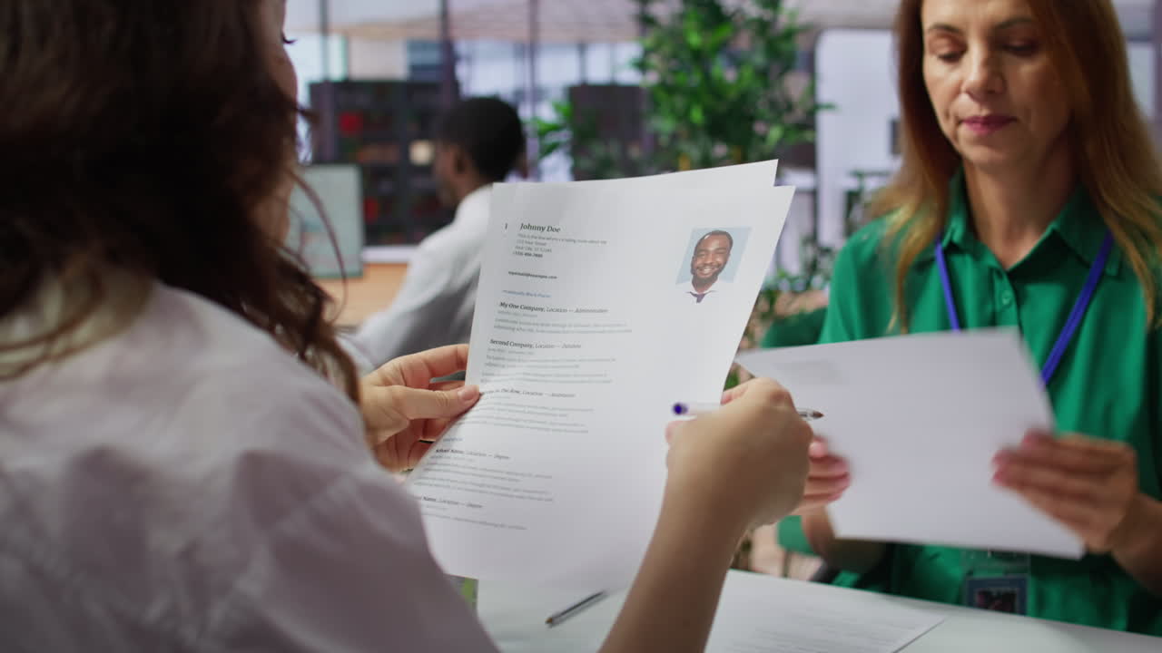 HR employers analyzing candidate CV after the job interview