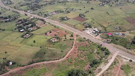 a road passing over the small settlers farmer in the village of loitokitok kenya africa