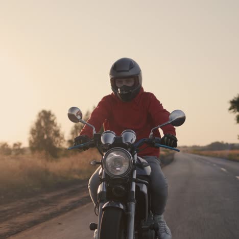 Silhouette-of-a-motorcycle-biker-riding-on-the-highway-2