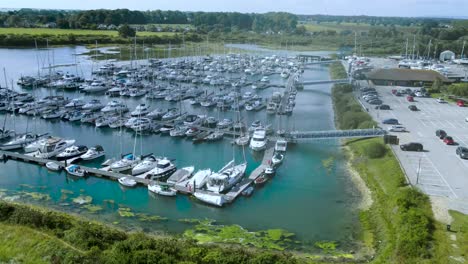 Aerial-view-across-Northey-marina-on-the-northern-shore-of-Hayling-Island,-Hampshire,-England