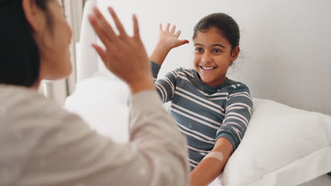 First-aid,-high-five-and-bandage-with-mother