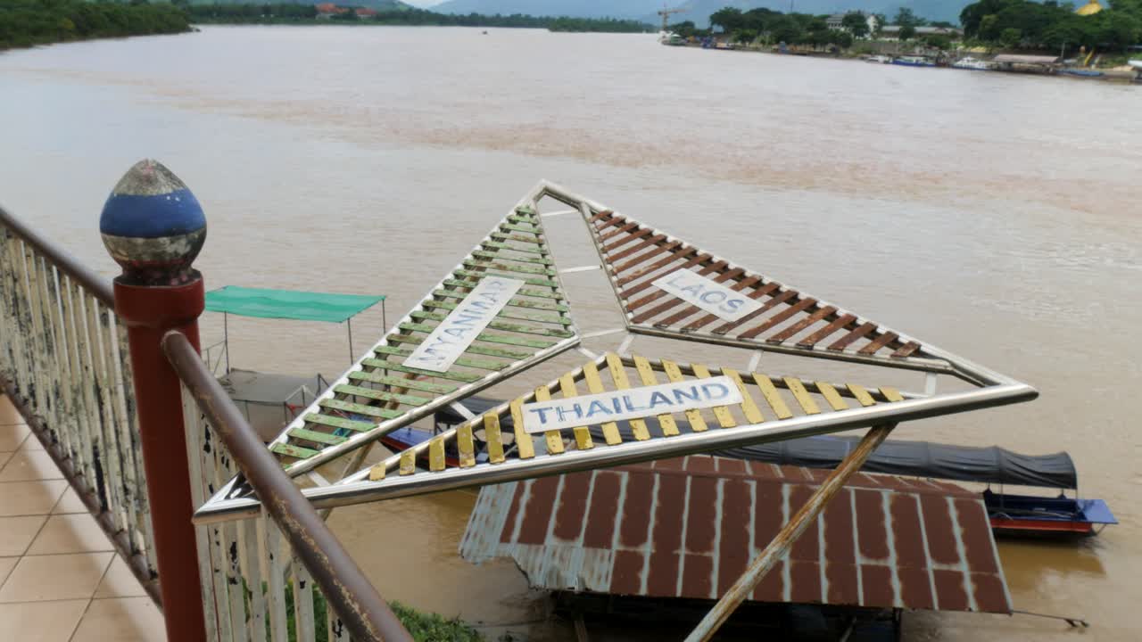 Golden Triangle Sign Over The Mekong River Between Three Countries Of Thailand, Myanmar And Laos. High Angle Shot