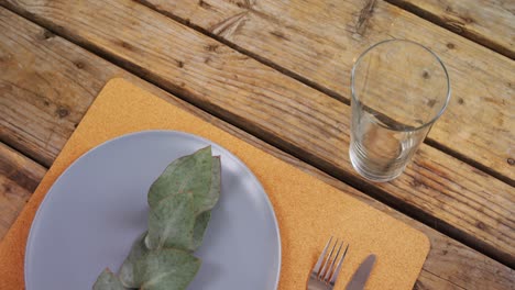 various cutlery on wooden table 4k