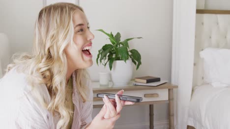 Happy-caucasian-plus-size-woman-talking-on-smartphone-in-slow-motion