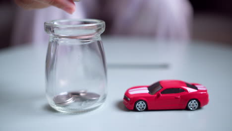 Slide-Shot-Money-in-Jar-For-Future,-Money-Plan-Management-for-car-Concept