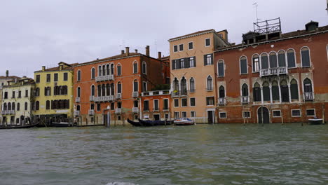 colorful venetian buildings along a canal
