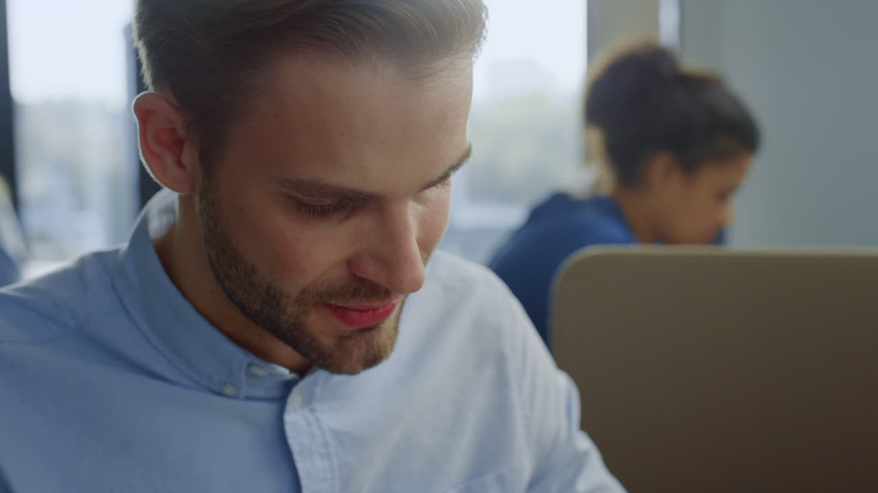 Businessman finishing conversation on phone. Professional calling on smartphone