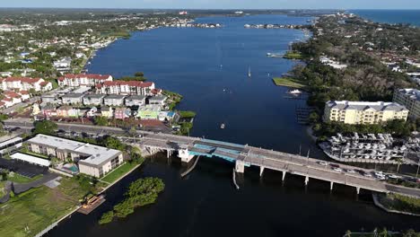 aerial stickney point bascule bridge on a warm sunny day in siesta key island, florida