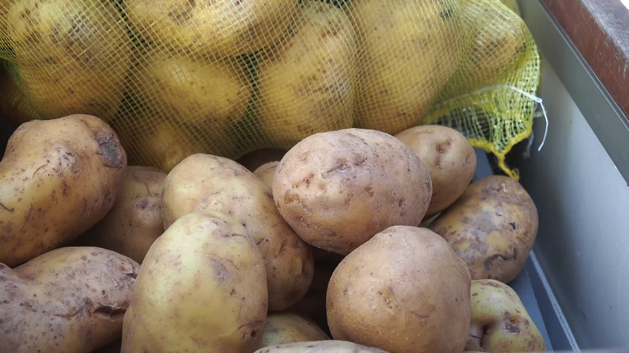A close-up of potatoes in a bag