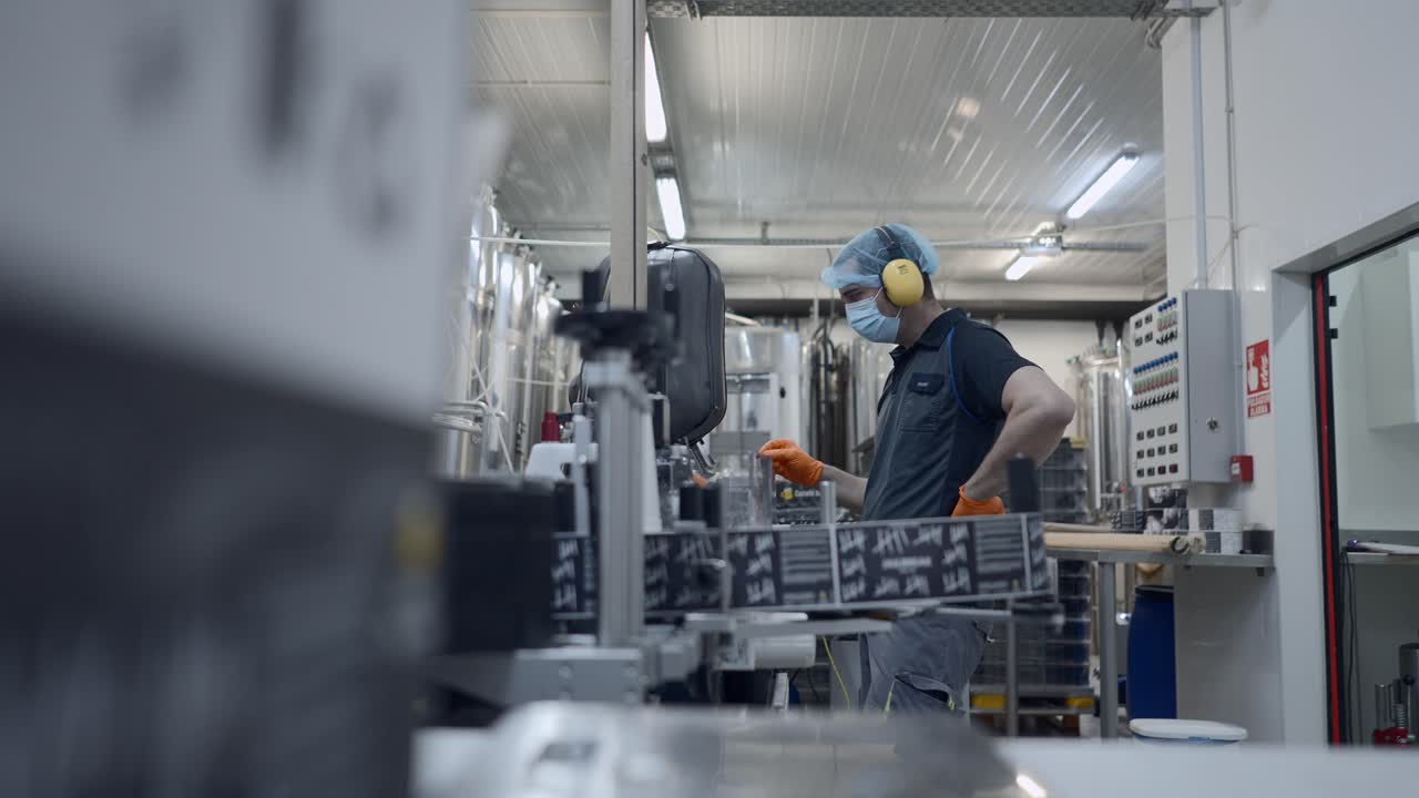 Worker in a brewery factory