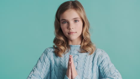 teenage caucasian girl relaxing in front of the camera.