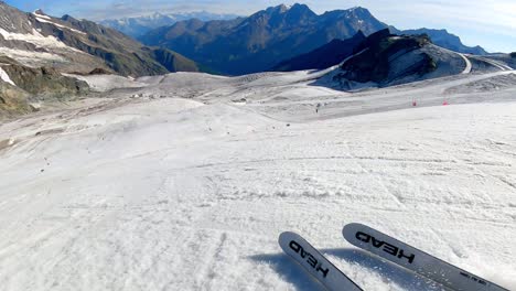 pov woman skiing in the mountains in switzerland