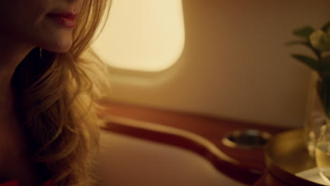 financial expert looking computer screen on plane. closeup hands touch trackpad