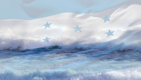 digital composition of waving honduras flag against waves in the sea