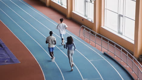 young people running indoors