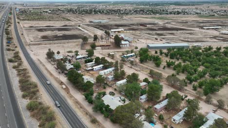 Farmhand-and-cowboy-houses-and-homes-in-trailer-park-next-to-feedlot-farm