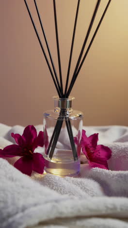 elegant aroma diffuser with pink flowers