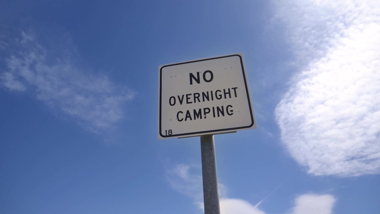 No Overnight Camping Road Sign Standing Beside Rural Road, New Mexico USA