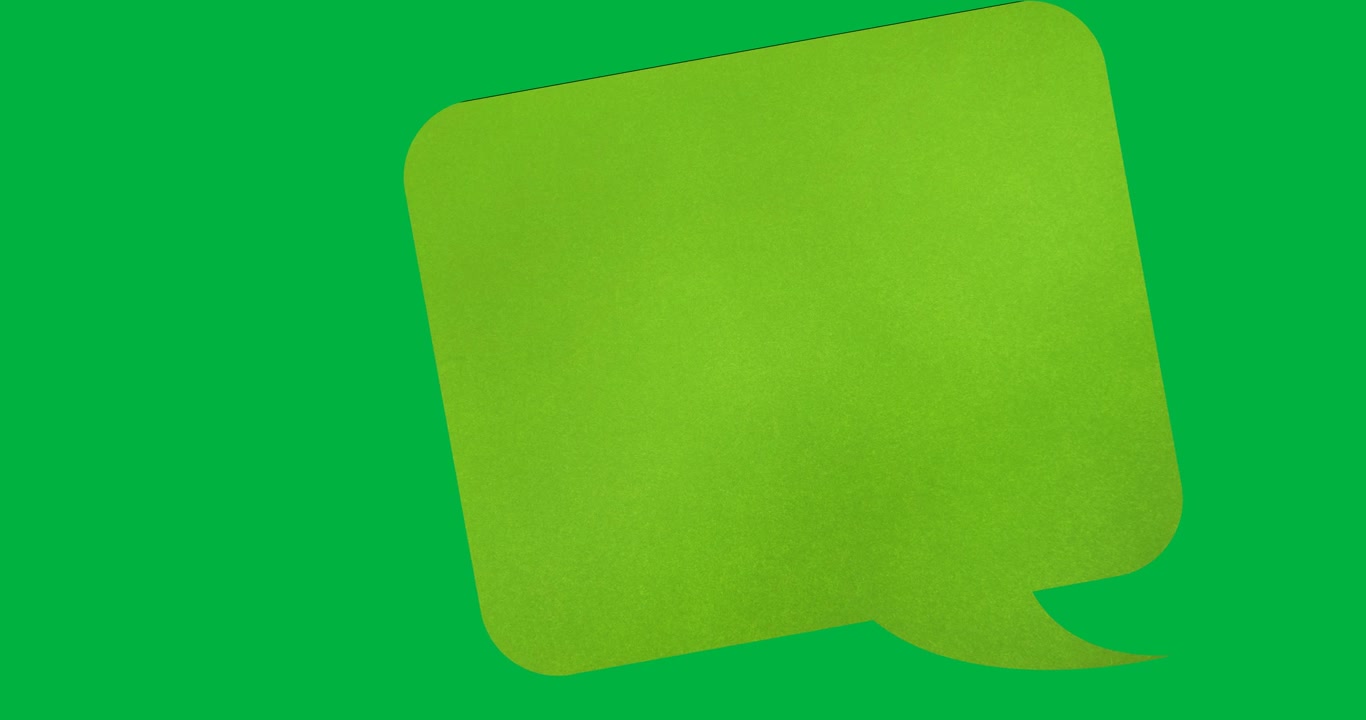 Digital animation of green blank speech bubble with copy space against black background