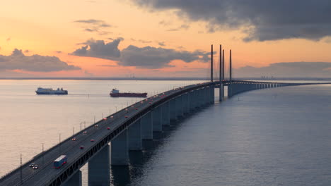 Traffic-over-Oresund-bridge-at-twilight-connecting-Denmark-and-Sweden