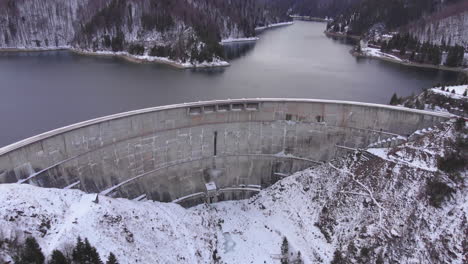 Aerial-view-of-the-Dam-and-lake-from-Valea-Draganului-at-winter-time-Romania