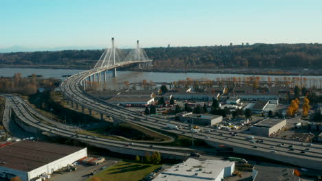 scenic aerial view of the port mann bridge over the fraser river in british columbia