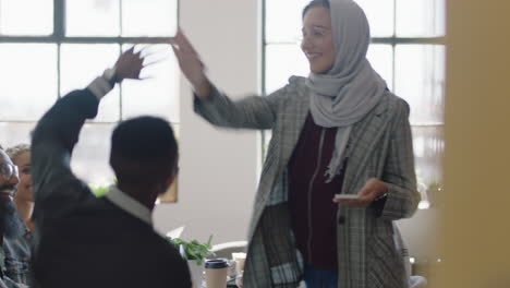 happy-business-people-high-five-celebrating-successful-startup-project-enjoying-teamwork-celebration-in-multi-ethnic-office-meeting