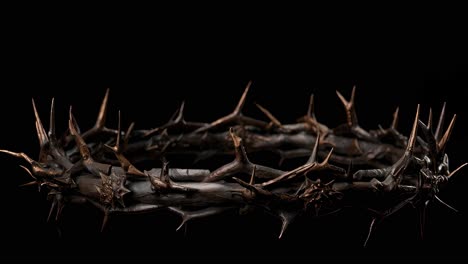 crown of thorns with copper and dark tones, evoking pain, sacrifice, and the crucifixion of jesus christ, resting on a reflective black surface, creating a dramatic and symbolic image