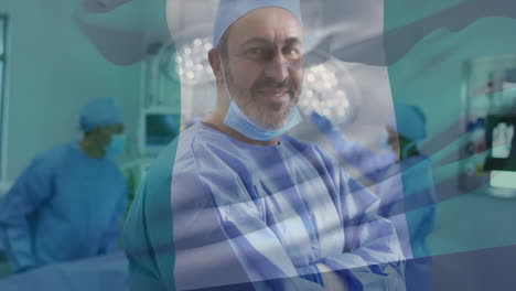 animation of flag of nigeria over biracial male surgeon in hospital
