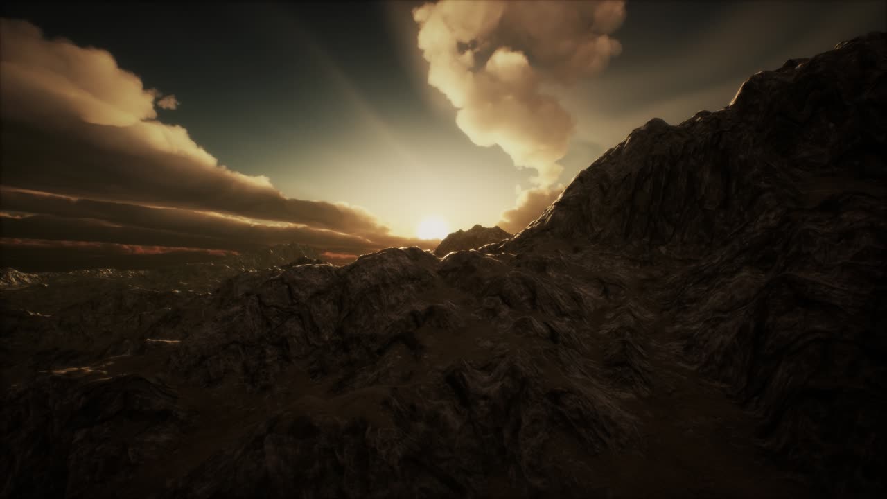 Sun Rays over Mountains in a Valley