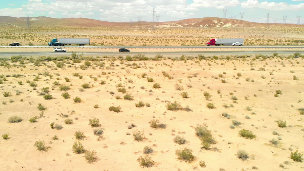 Aerial Slide Along Straight Desert Highway