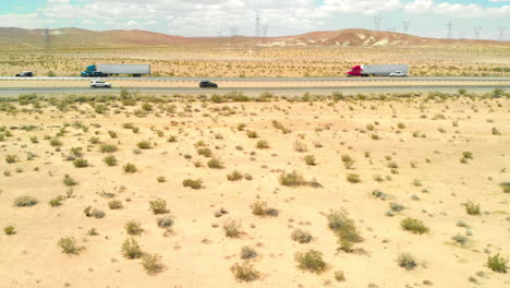 aerial slide along straight desert highway