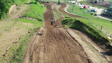 aerial view of motocross track with racers