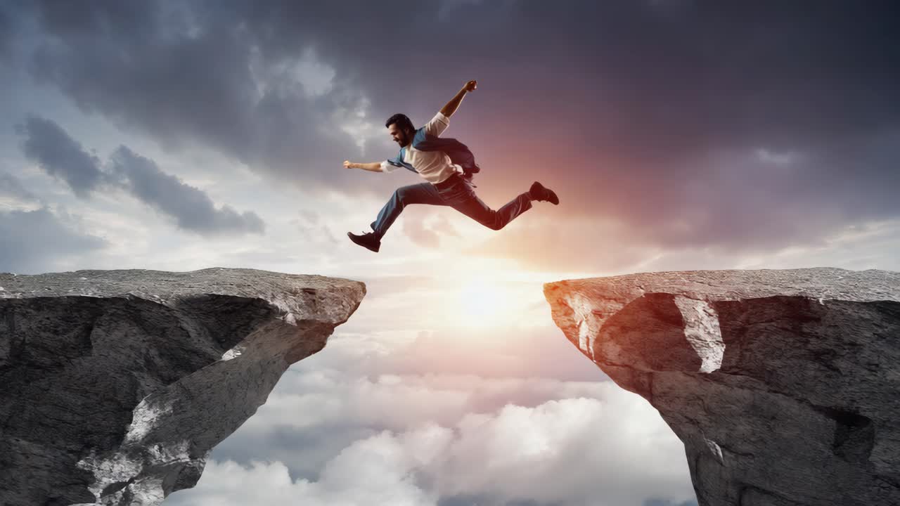 Man taking a leap of faith across a cliff gap