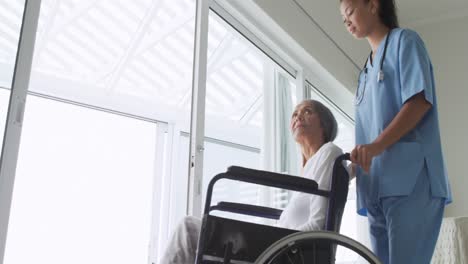 Mature-woman-in-a-wheelchair-and-nurse