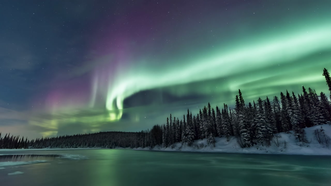 Vibrant Northern Lights Over Frozen River Sweeping Green And Purple Ribbons Across Starry Sky, Snowcovered