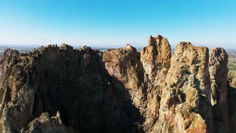 farmland-around-smith-rock-state-park-on-a-clear-day,-drone,-Central-Oregon