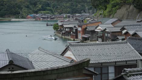 fisherman houses in ine-cho, pan shot across rooftops in kyoto japan