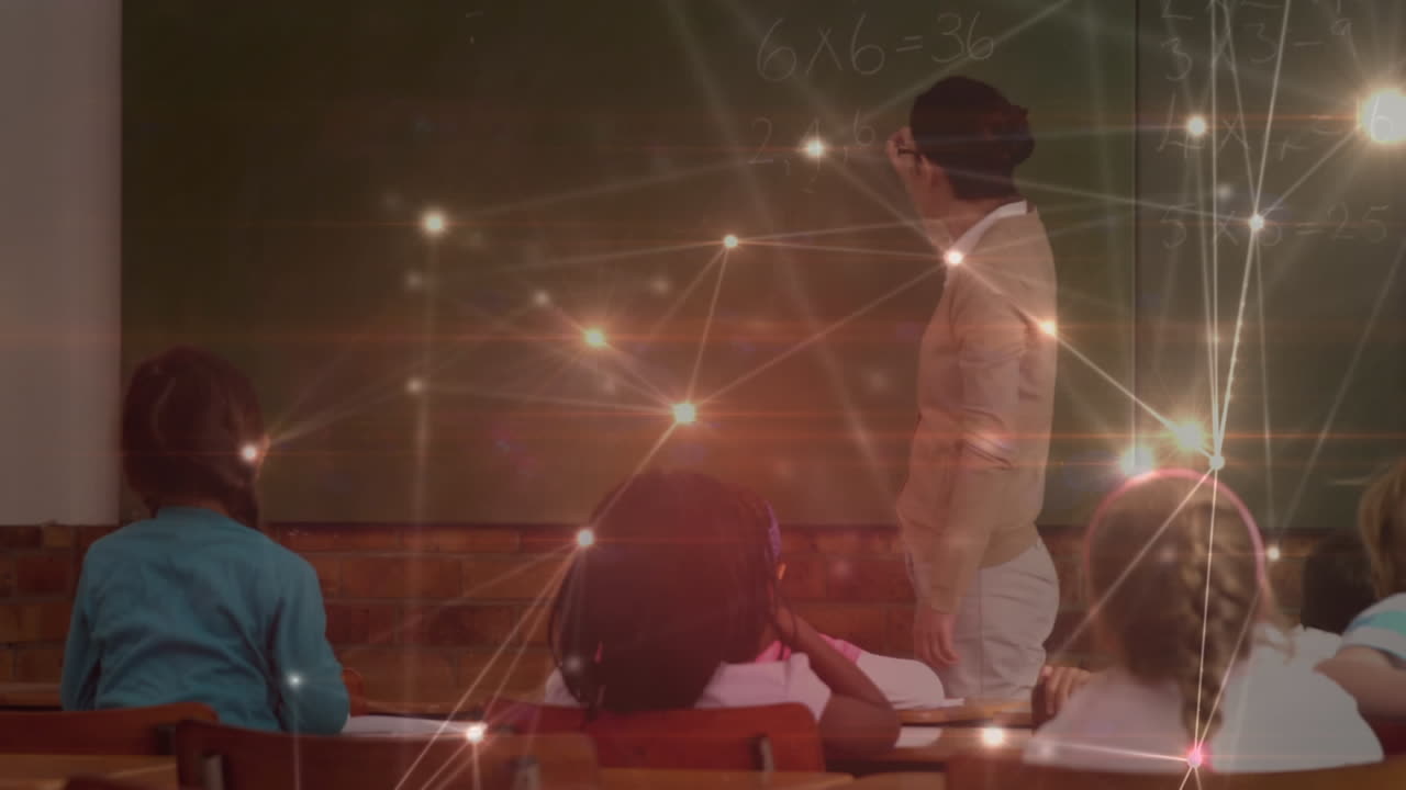 초등학교의 교실에서 학생들을 가르치는 여성 교사들에 대한 연결의 빛나는 네트워크